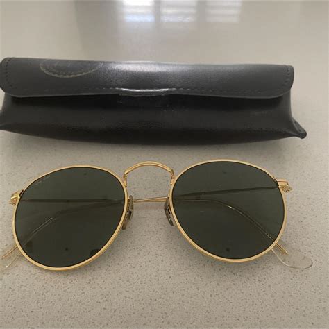 round gold mettal sunglasses